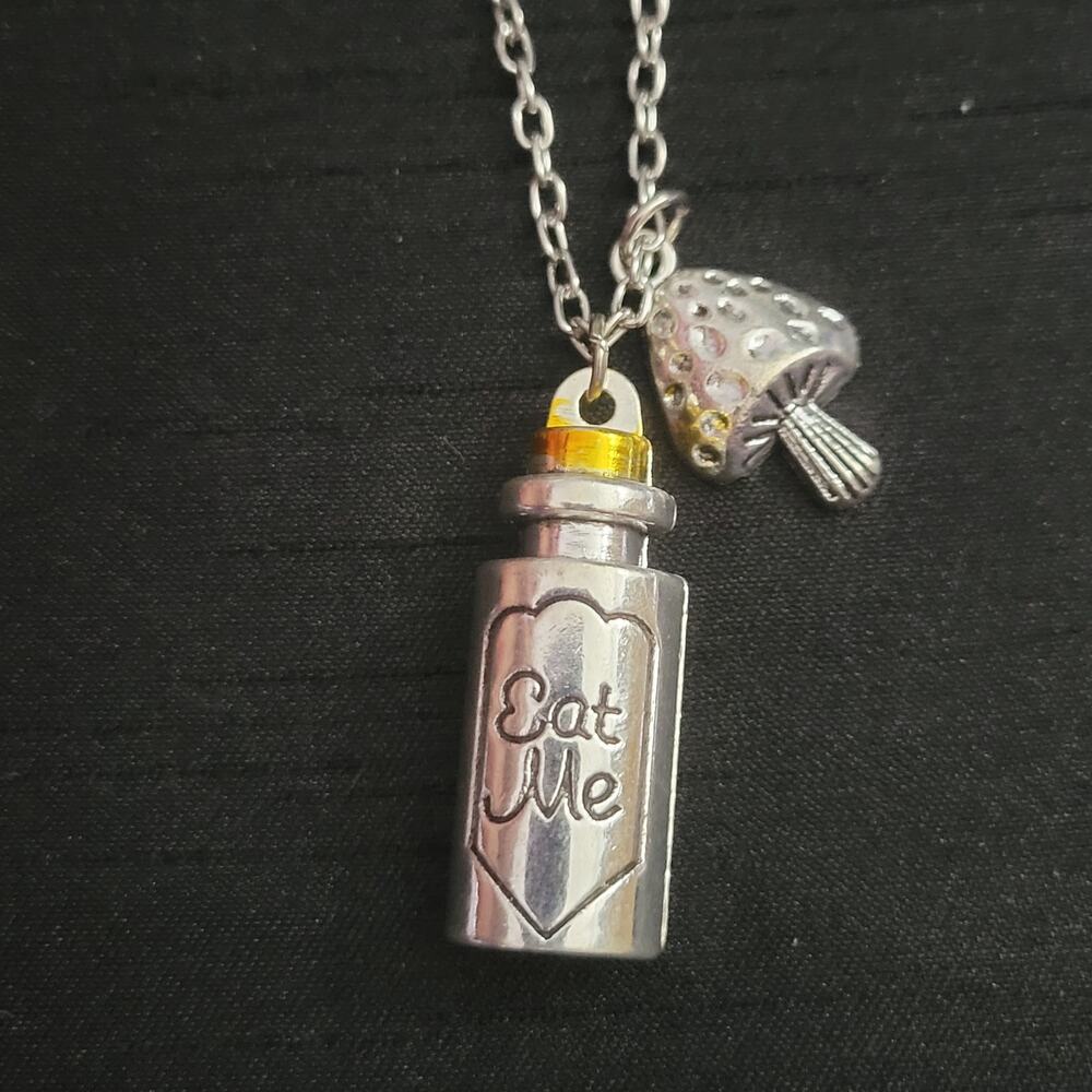 Alice in Wonderland Eat Me pendant necklace with mushroom charm silver & gold